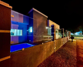 Casa em Xangri-lá com piscina.